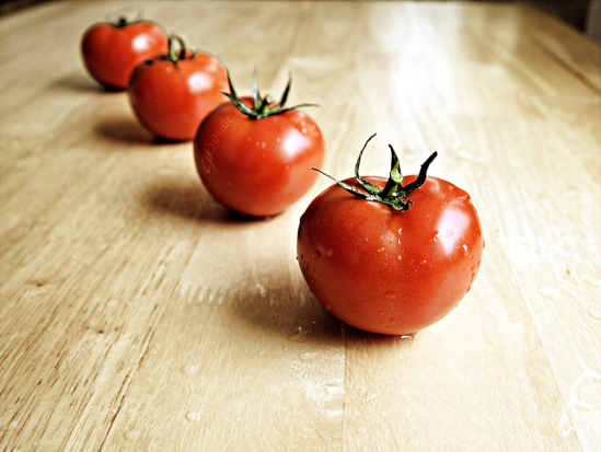 Healthy Red Tomatoes are Wet and Organic